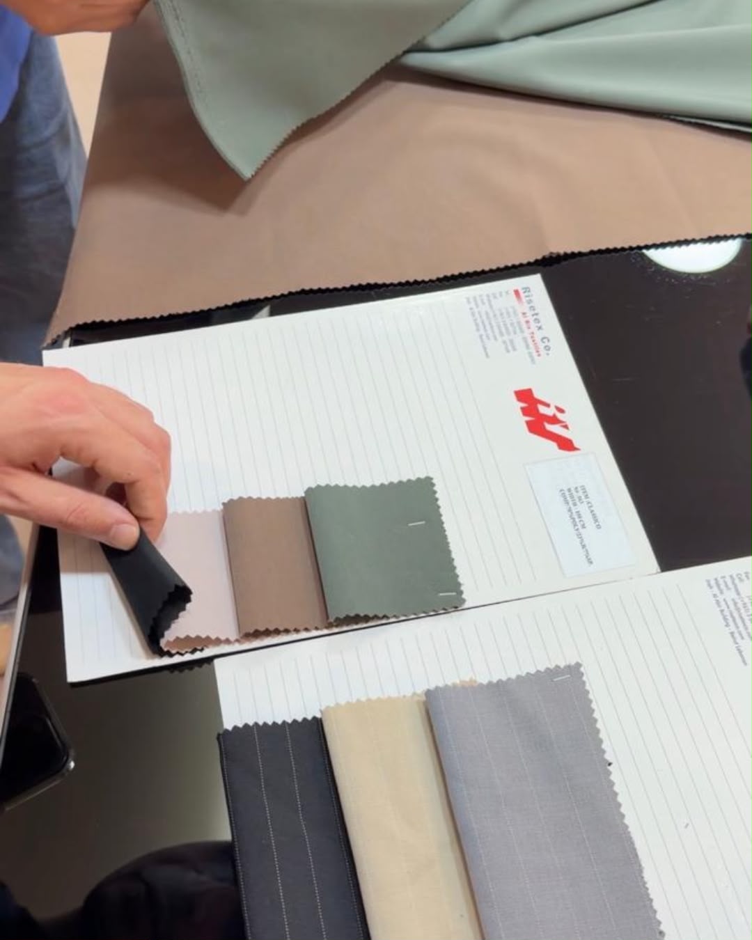 A swatch book open on the table in Beirut